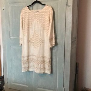Free People DRESS in Size Large . Colour White with Beige embroidery design